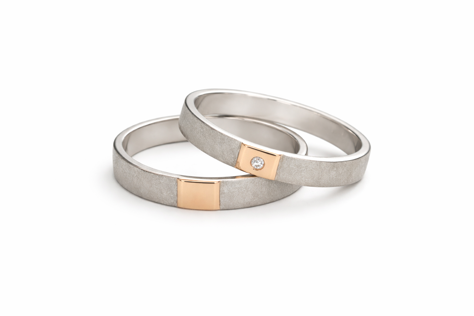 Aliances bicolor or blanc i placa central d'or rosa 18k amb brillant