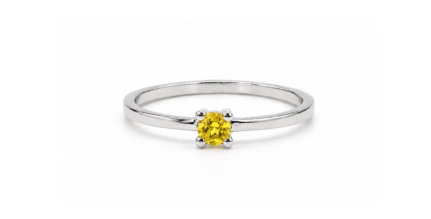 Anell de plata amb pedra de color talla brillant